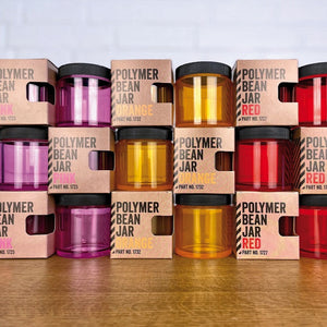 Comandante Polymer Bean Jar Bohnenbehälter in Orange, Pink und Rot mit Deckel und teilweise mit Verpackung